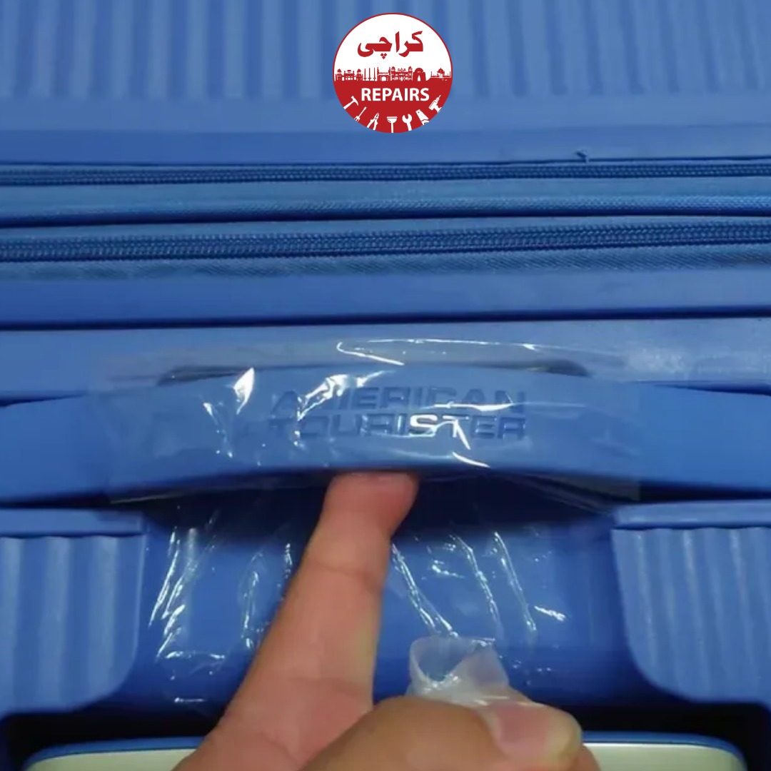 Hard-shell and soft-shell American Tourister luggage bags undergoing comprehensive repair in Karachi
