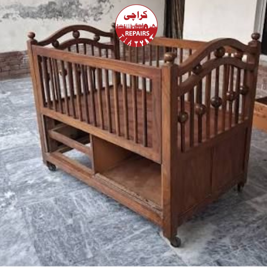 Expert carpenter ensuring child-safe finishes and non-toxic wood repairs on a crib