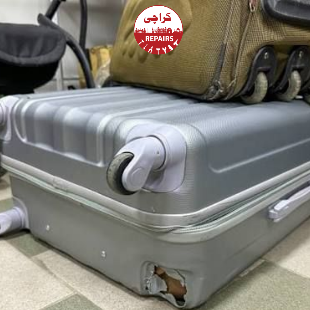 Expert replacing broken luggage wheels and repairing suitcase handles in Karachi