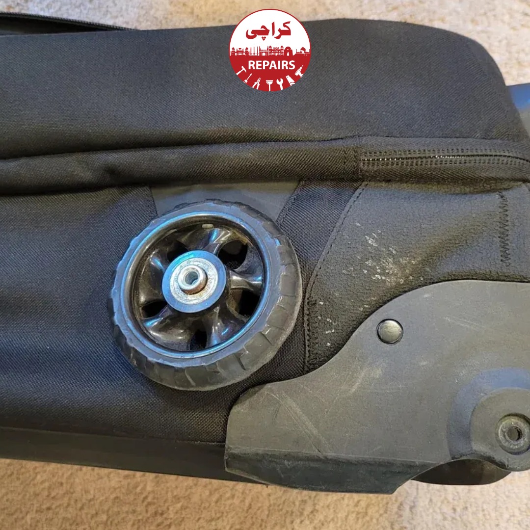 Hard-shell and soft-shell luggage bags undergoing wheel replacement in Karachi