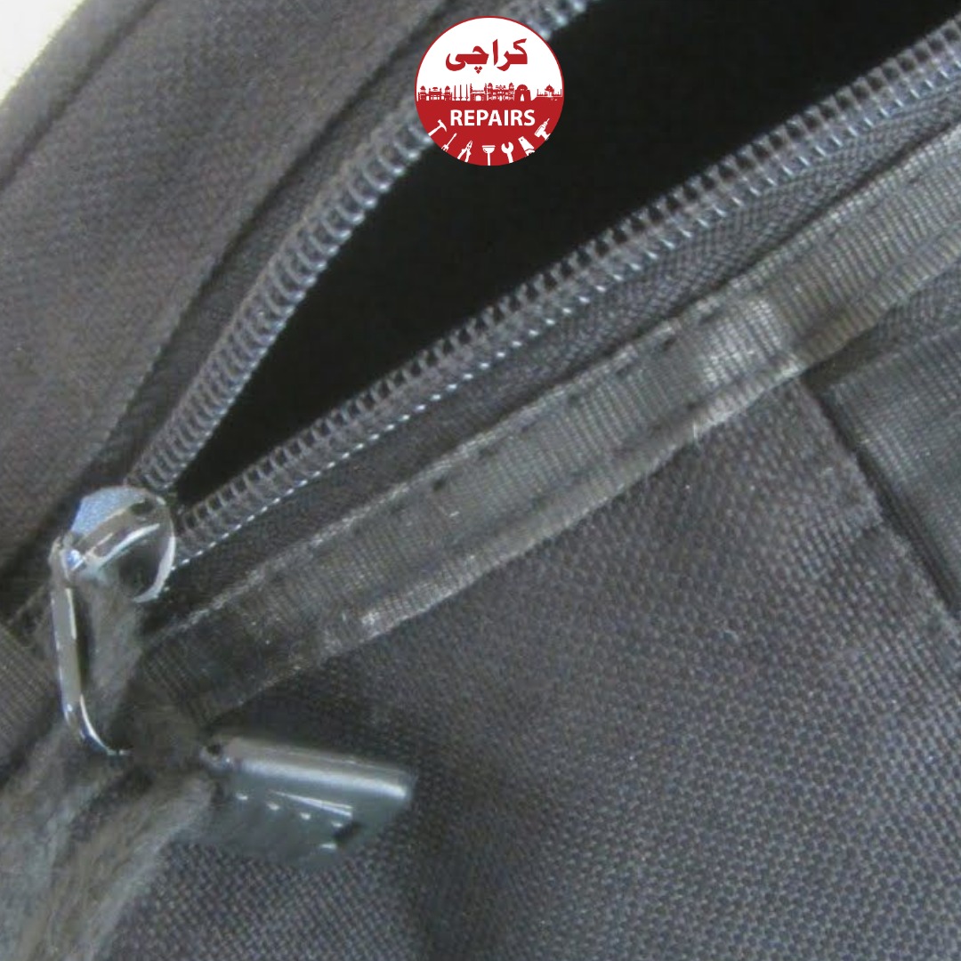 Expert repair technician recalibrating a heavy-duty luggage zipper slider