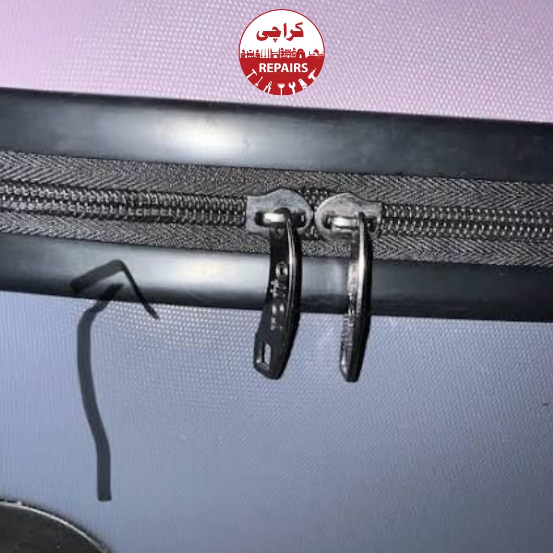 Hard-shell and soft-shell luggage bags undergoing zipper slider replacement in Karachi