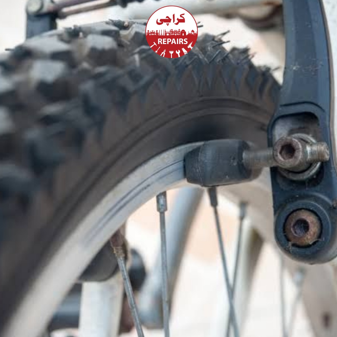Various types of bicycle brakes including disc brakes and V-brakes being repaired in Karachi