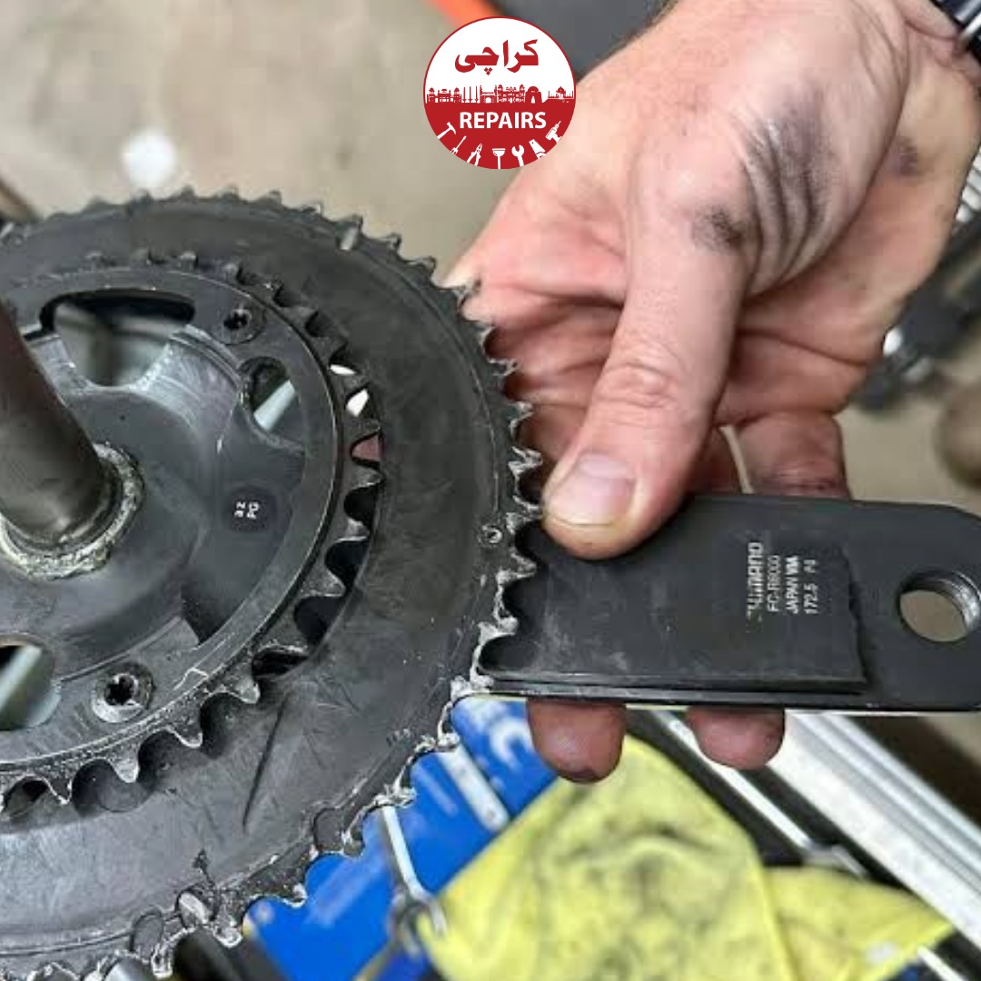 Various types of Shimano Hollowtech and SRAM DUB cranksets undergoing repair in Karachi