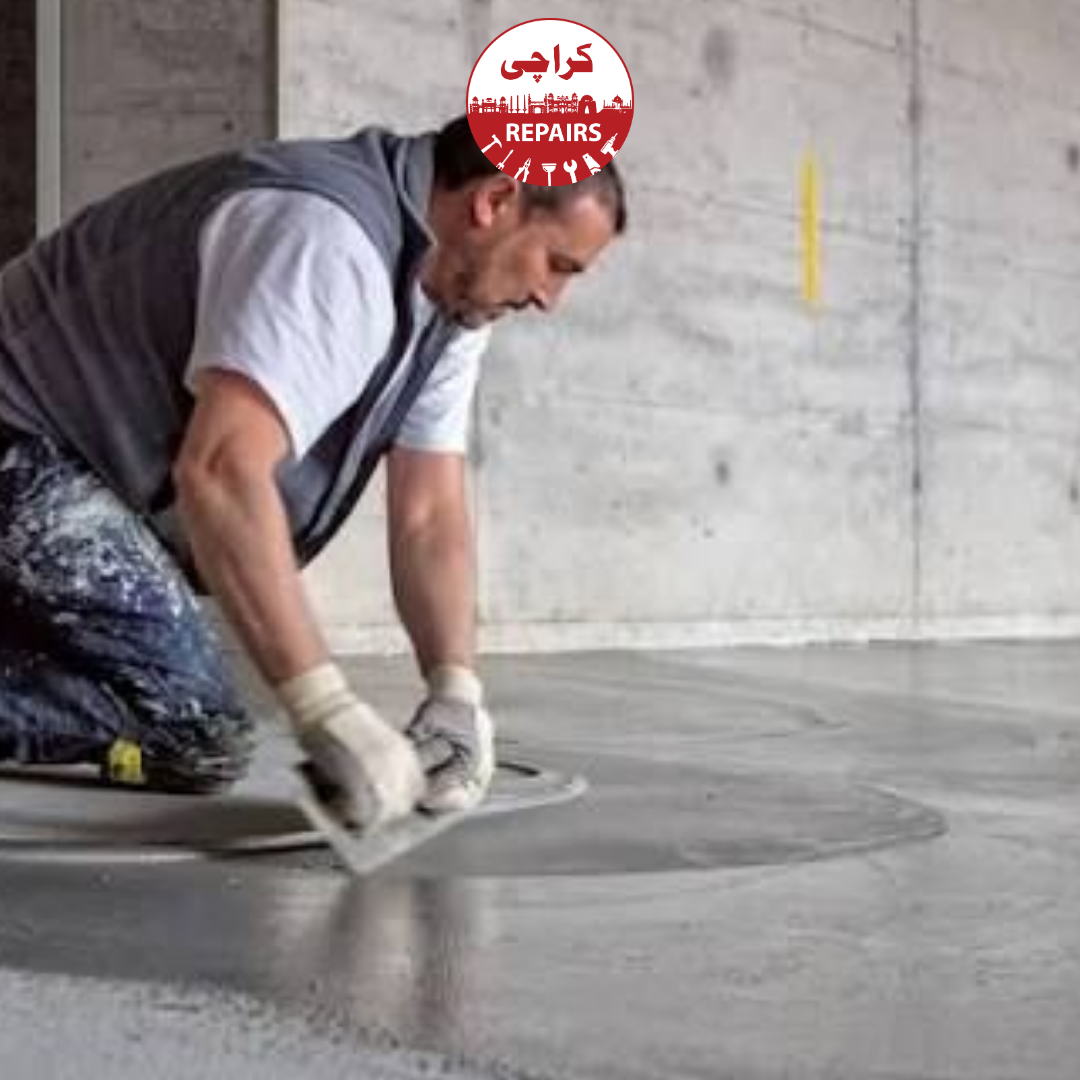 Masons establishing laser-guided levels for precision floor screeding in Karachi