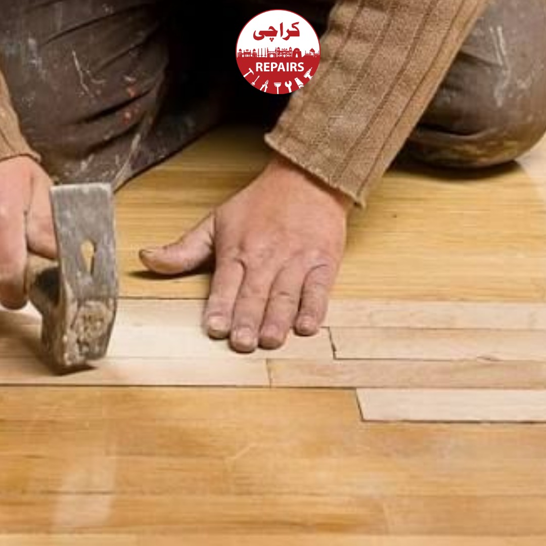 Expert handyman replacing a broken ceramic tile on the floor in Karachi