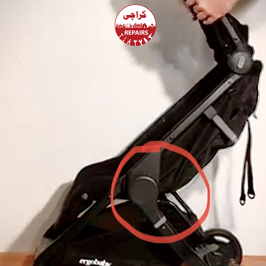Professional mechanic safely repairing the internal cable of a stroller folding joint