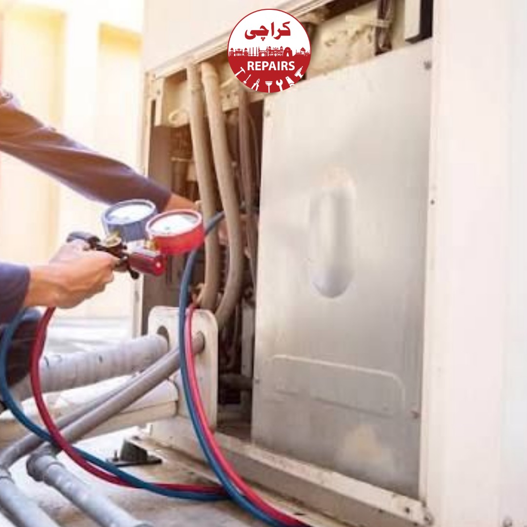 Technician repairing a split air conditioner compressor and copper piping in Karachi