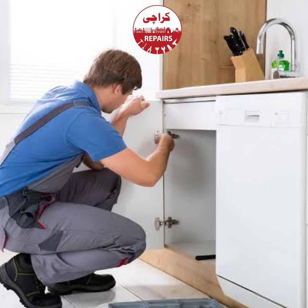 Carpenter replacing damaged kitchen cabinet hinges and baseboards in Karachi