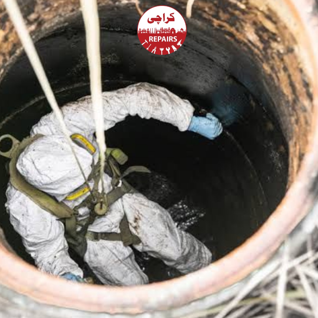 Civil engineers constructing a heavy-duty brick masonry manhole with precision benching channels in Karachi