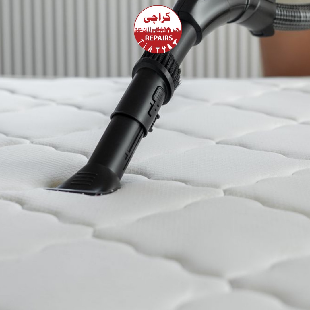 Expert cleaning technician applying pH-balanced emulsifiers to mattress upholstery