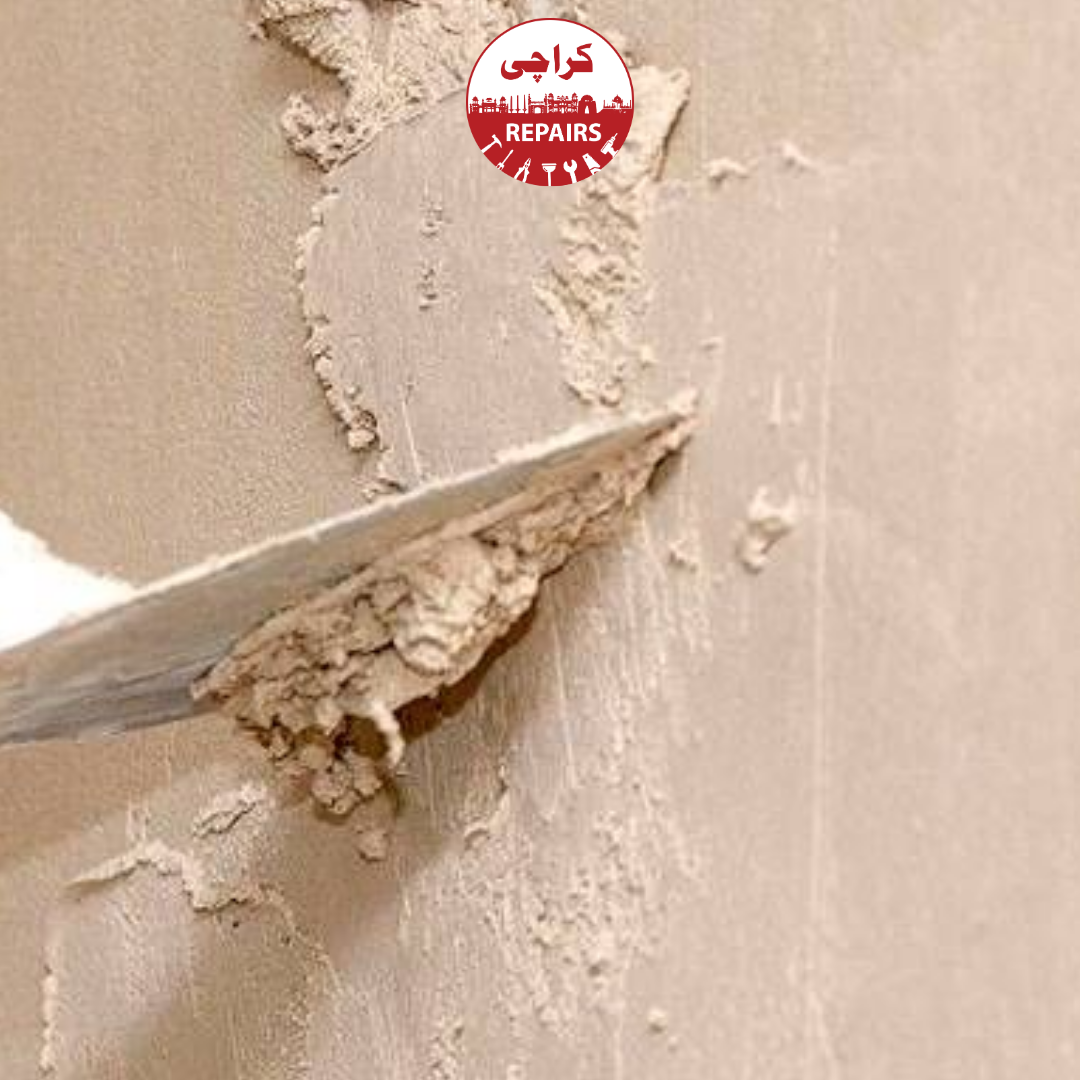 Expert mason aligning a plaster patch flush with the existing wall using an aluminum screed