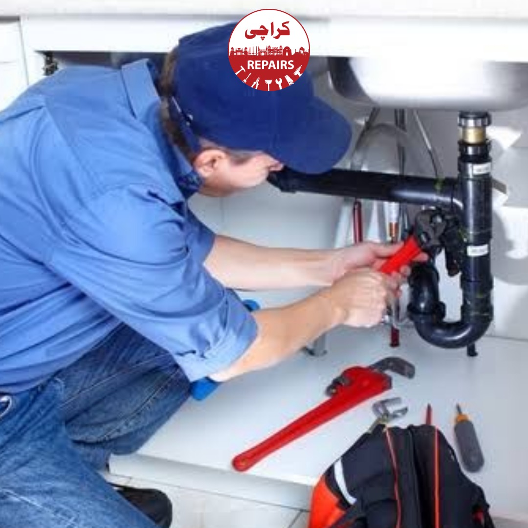 Professional plumber using safe wrenches to tighten bathroom fittings without scratching tiles