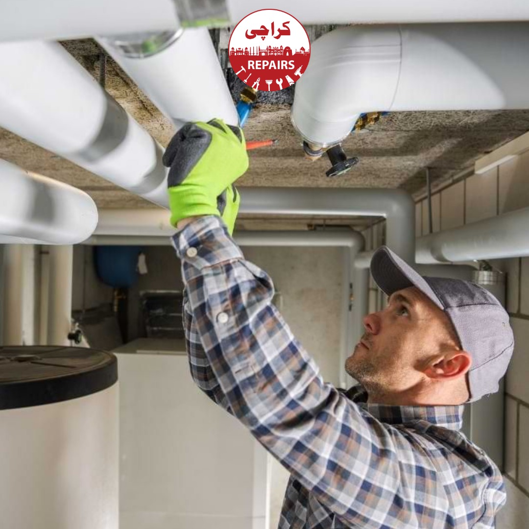 Expert plumber using tools to fix a leaking pipe under the sink in Karachi