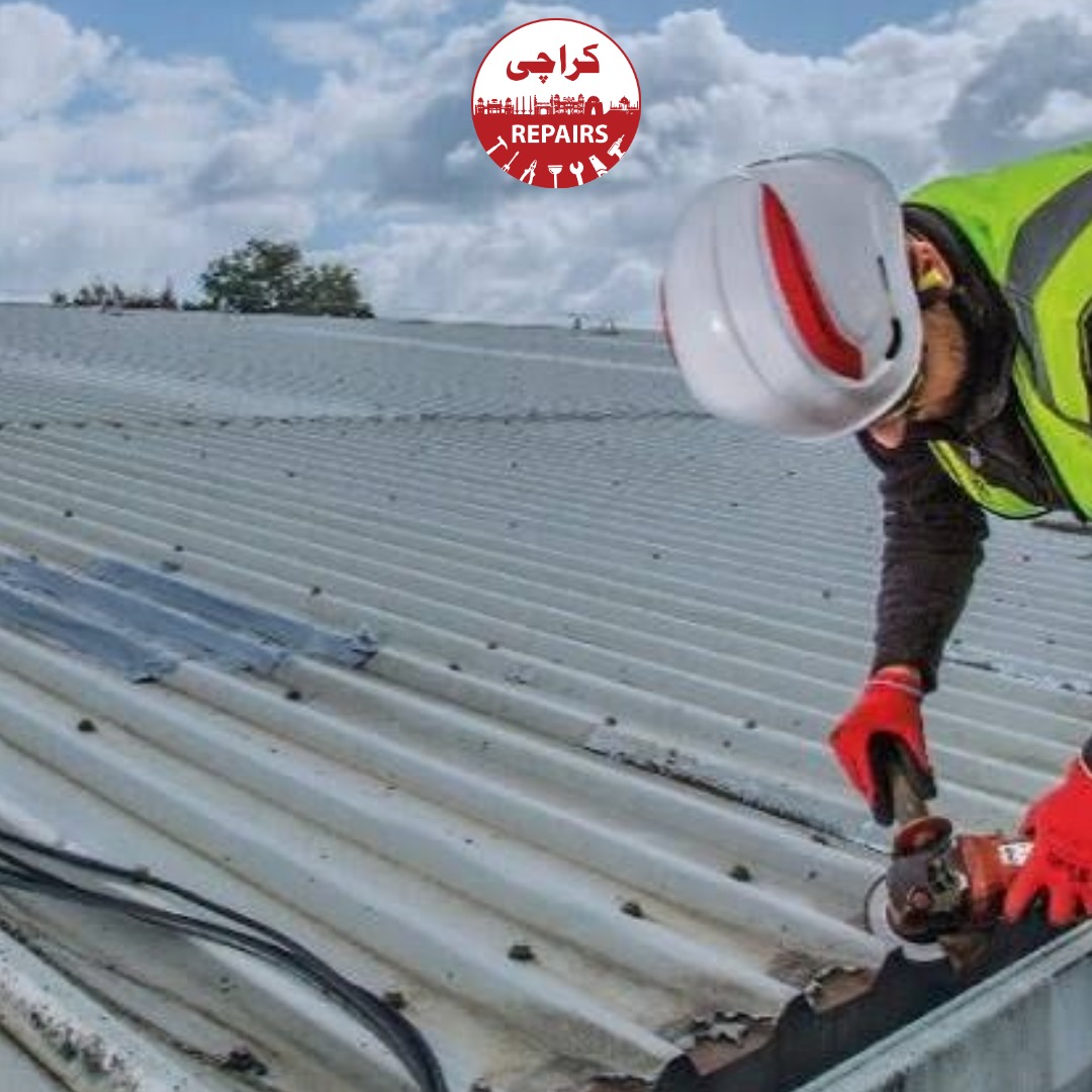 Professional safely applying heavy waterproofing chemicals to a damaged rooftop
