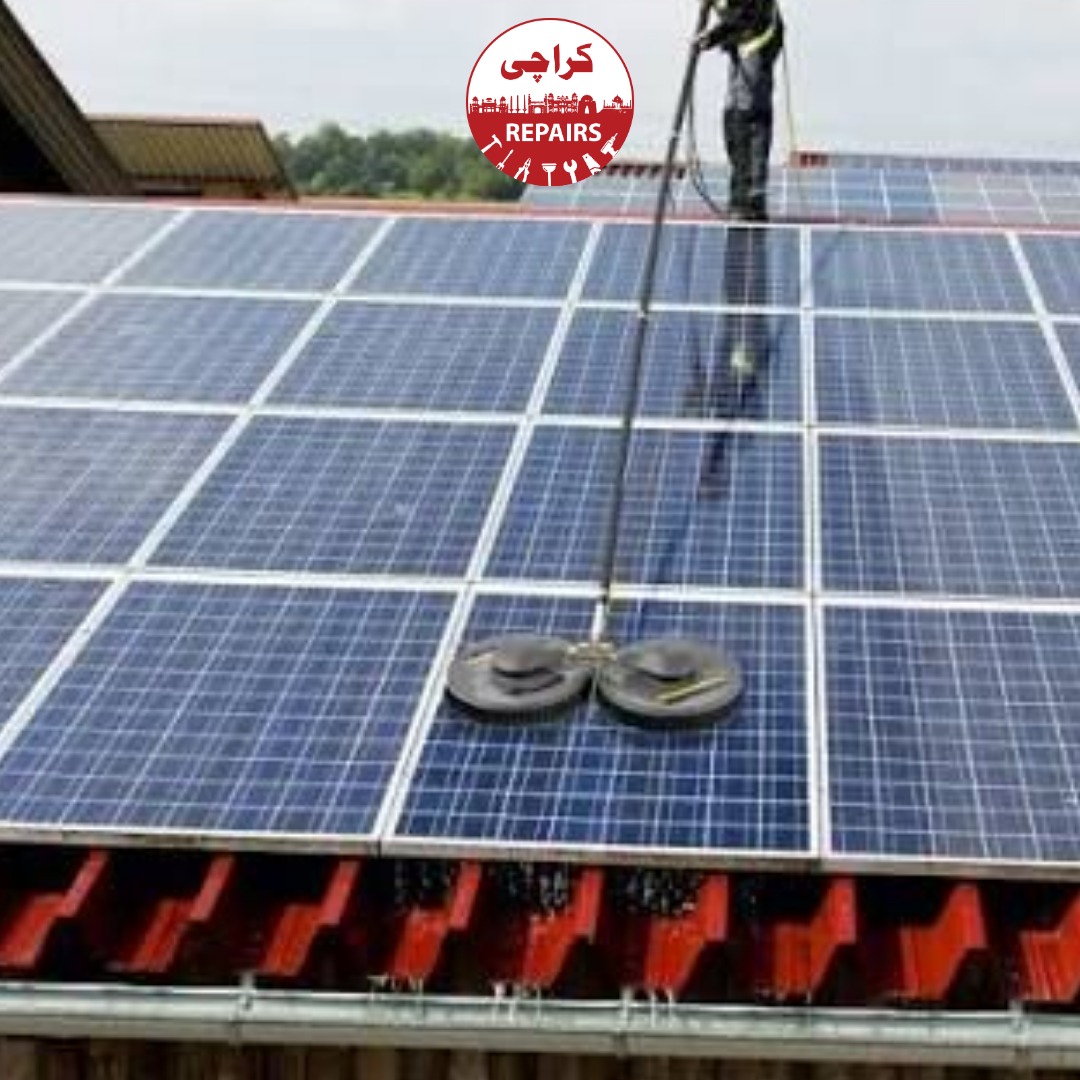 Expert solar cleaning technician applying pure deionized water to photovoltaic cells