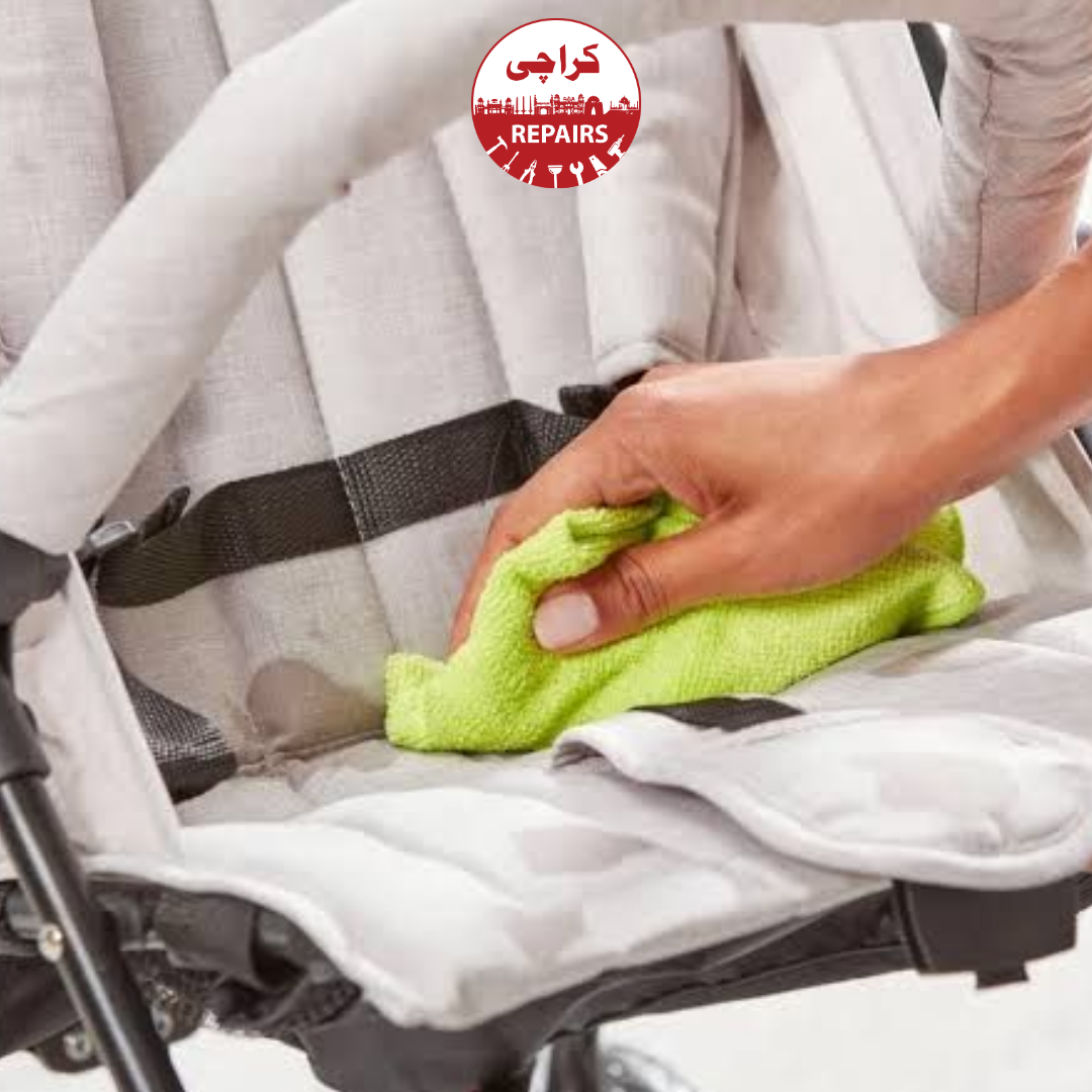 Using a hot steam cleaner machine to kill germs safely on a baby pram fabric