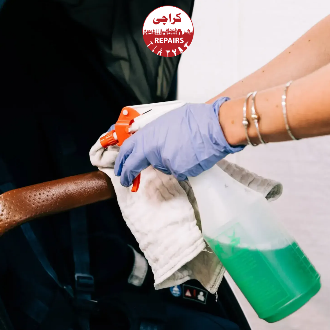 Cleaning expert scrubbing a dirty baby stroller seat to remove old food stains in Karachi