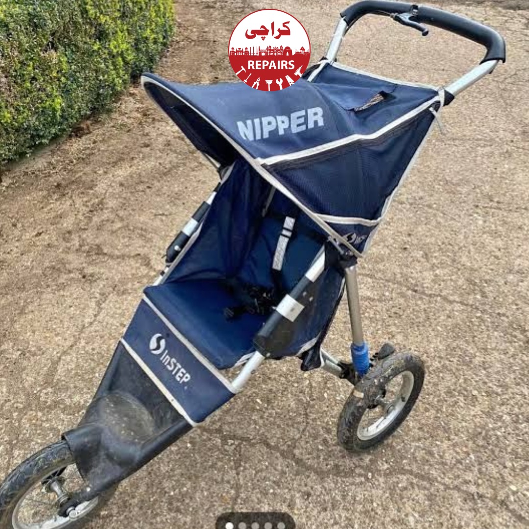 Various types of baby strollers including luxury prams getting their canopies fixed in Karachi