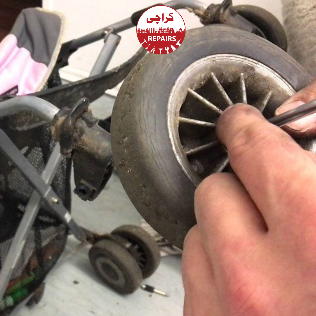 Expert repairing a baby pram safely without scratching the metal frame