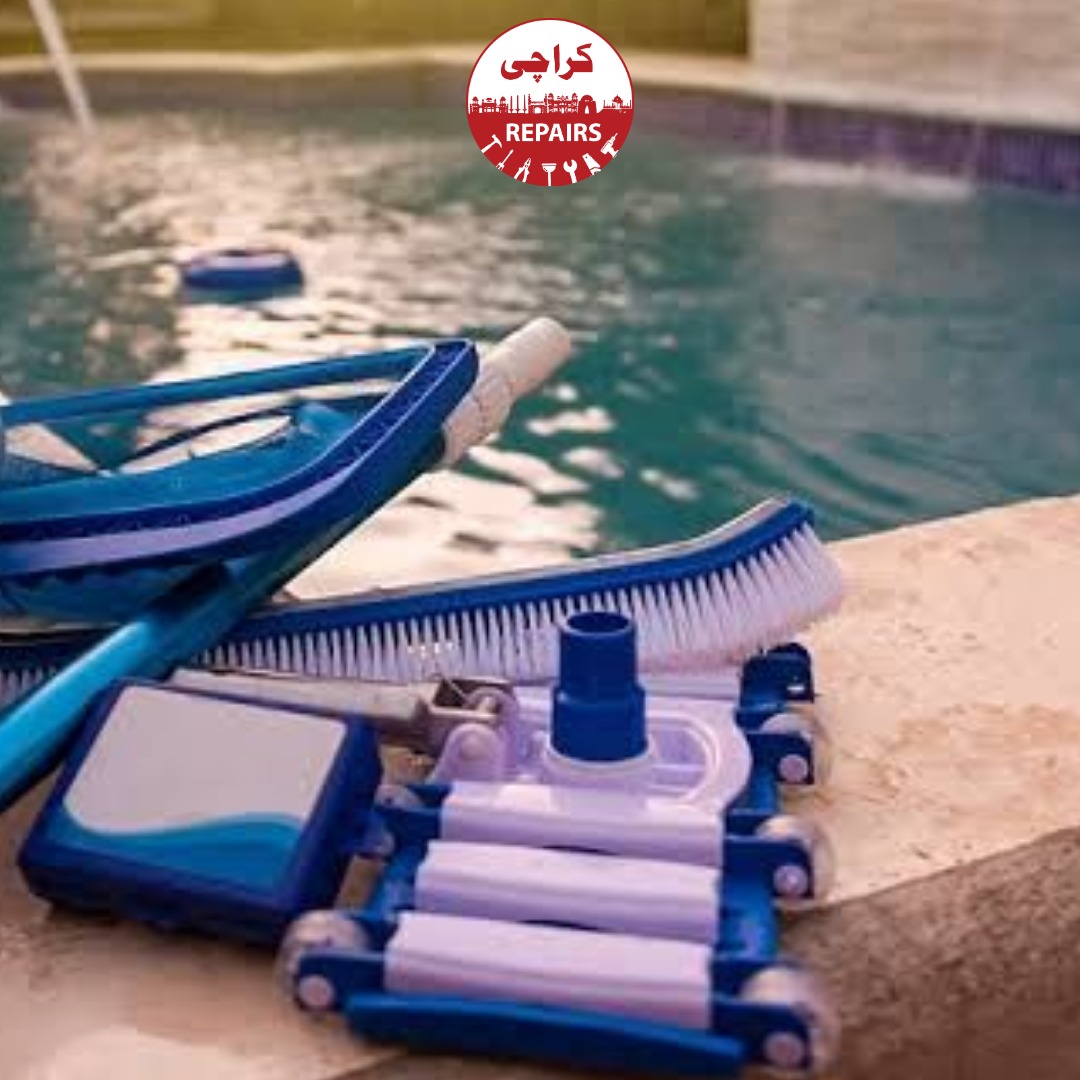 Technician performing industrial vacuuming and algae removal on a swimming pool in Karachi